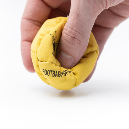 Amber 8 Panel Metal Filled Footbag